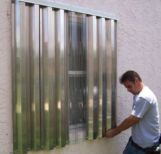 Storm Panels - factory-direct hurricane protection by Hurricane Shutters Florida